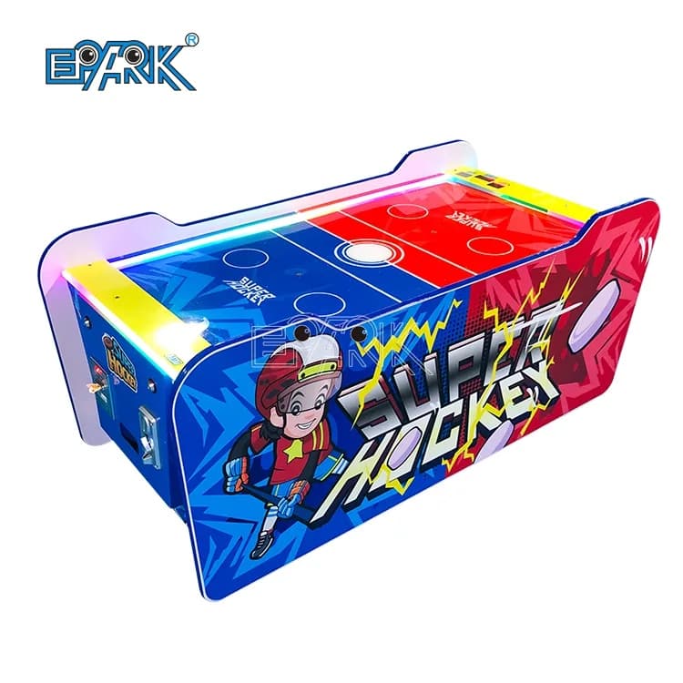 Compact red and blue two-player air hockey table on a white background