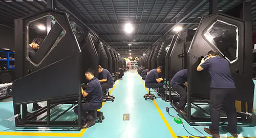 EPARK technicians assembling arcade machine cabinets