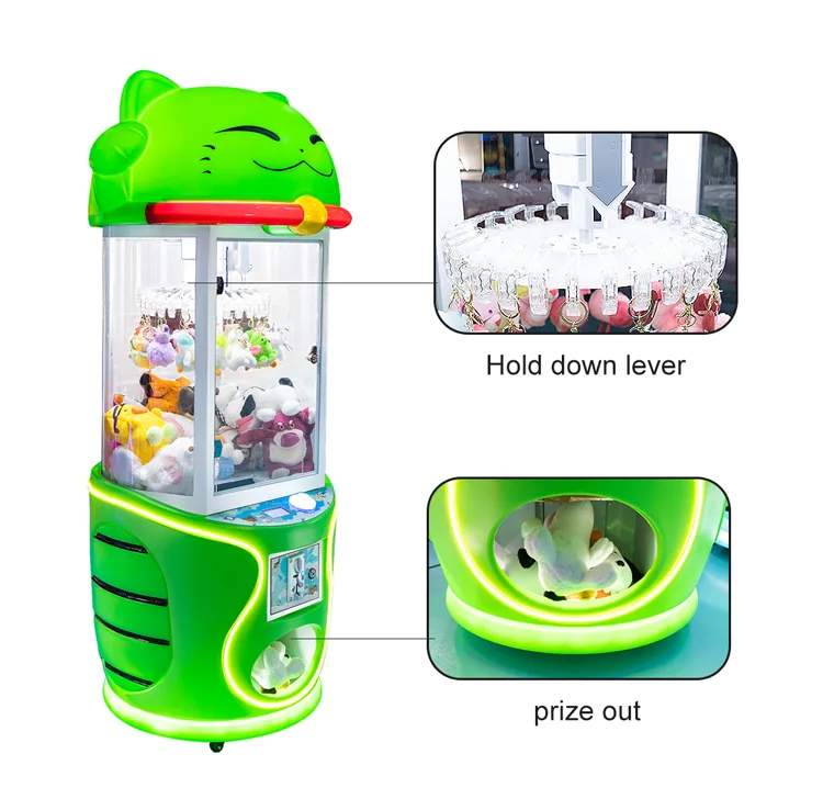 Hold-down lever and prize outlet details on the cat-themed clip machine