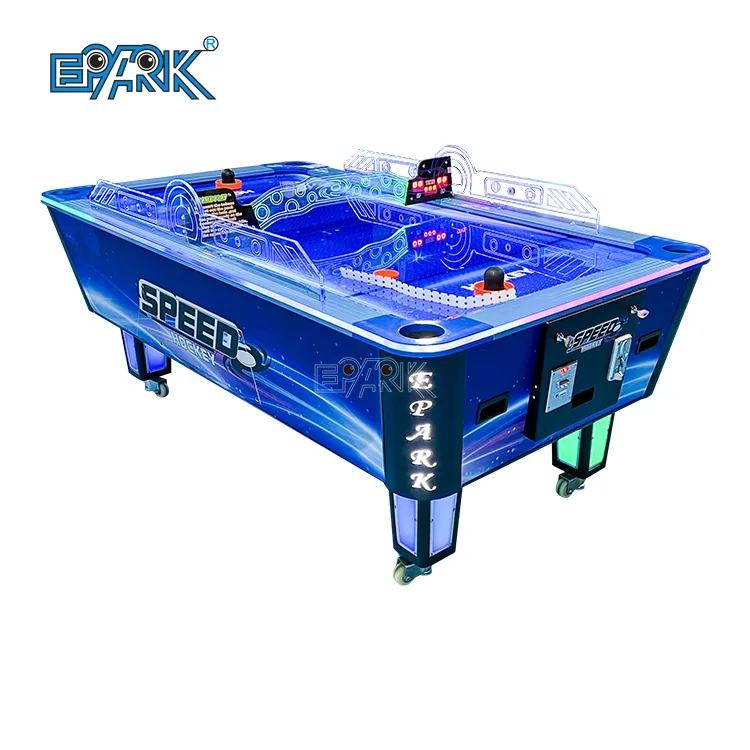 Coin-operated blue air hockey table on a white background