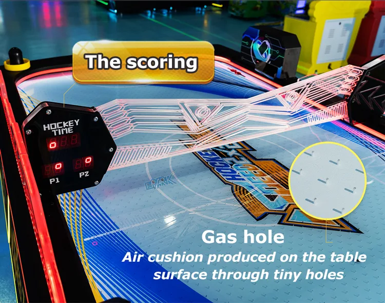 Electronic scoring and airflow playfield detail on the air hockey table