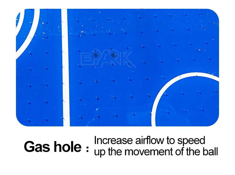 Airflow holes across the compact air hockey playfield