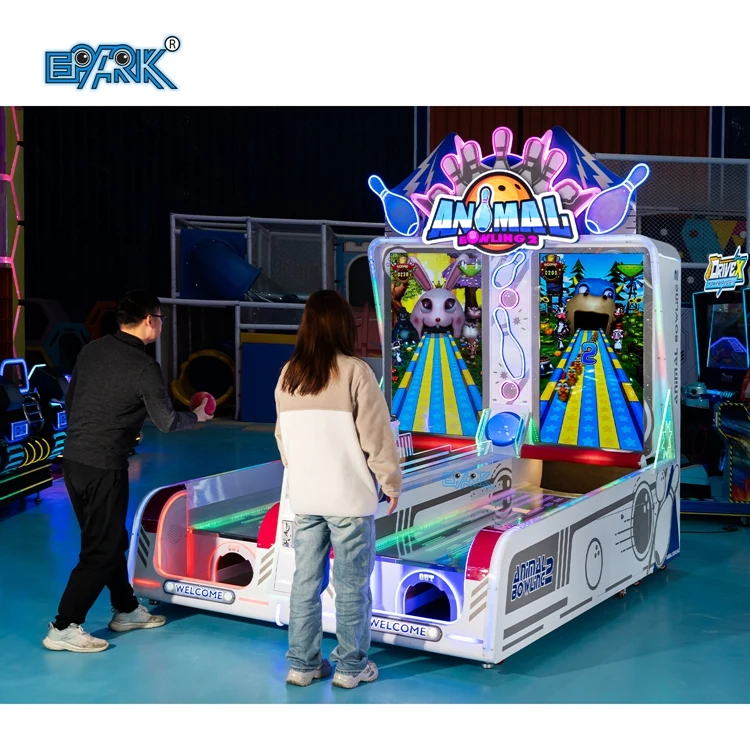 Two players using a dual-lane 65-inch bowling arcade machine