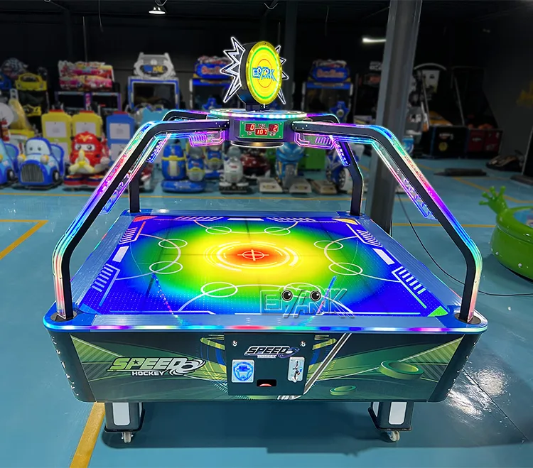 Front view of the illuminated four-player air hockey table in a showroom