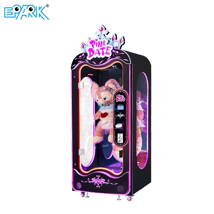 Tall black and pink large-toy scissor prize machine with an illuminated cabinet