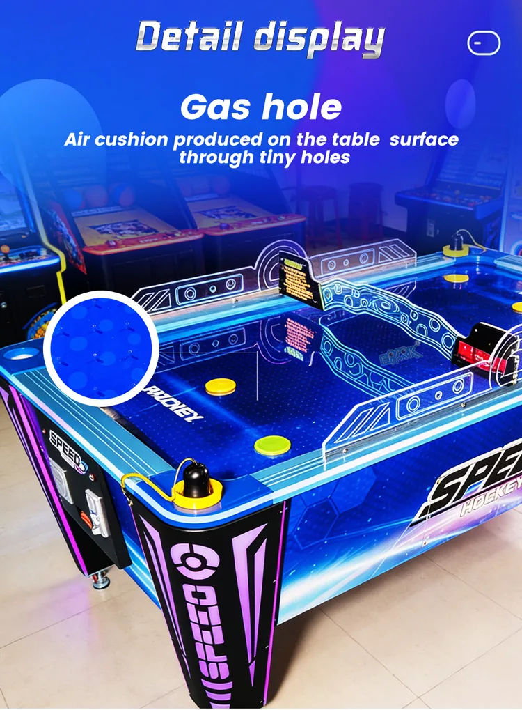 Airflow playfield detail on the illuminated blue air hockey table