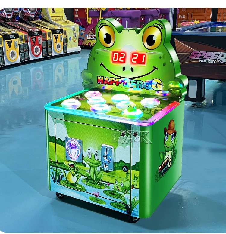 Illuminated green frog hammer machine on an arcade showroom floor