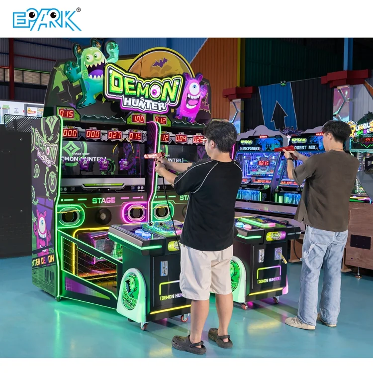 Two players aiming sensor guns at linked monster target cabinets