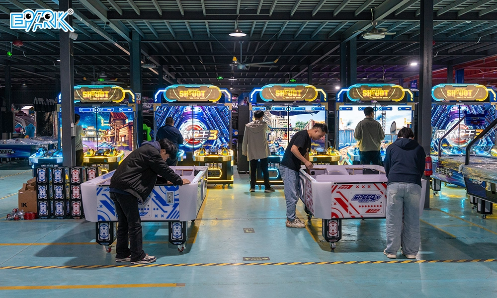 EPARK workers assembling commercial air hockey tables on the production floor
