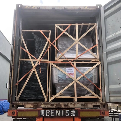 Protected amusement machines secured inside a shipping container